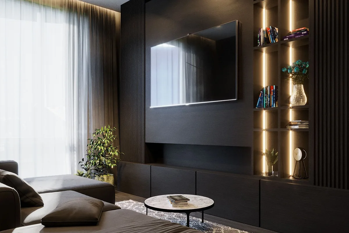 Television and seating arranged in a modern living room.